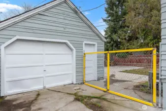 Good sized garage with pull up doors at front and rear
