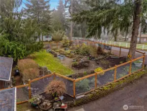 The six-foot fence keeps the wildlife from munching on your crops and ornamentals.