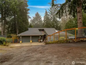 Parking is ample on this drive way and you can even park an RV and have plenty of space left for guests.