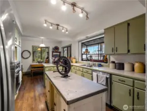 This farm kitchen is charming yet so functional. Please note that the kitchen island does not convey with the home.