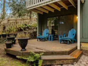 The deck outside the Daylight basement family room allows you to sit under cover or out in the sun.
