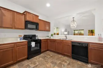 The eat-in kitchen is SO spacious and functional for many uses