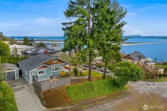 Expansive corner lot with panoramic views of Lake Washington, Mt Rainier and Bellevue.