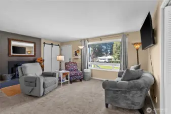 Hardwood floors lie beneath the current flooring—ready to be revealed and restored.