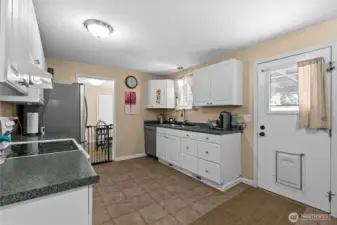 A pet door allows easy access to the fenced backyard for our 4-legged family members!