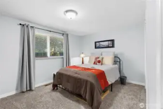 Bedroom #2 overlooks the back yard.