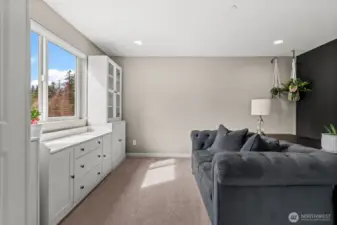 Just up the stairs, enjoy this office or flex space with built-in cabinetry and lots of natural lighting!