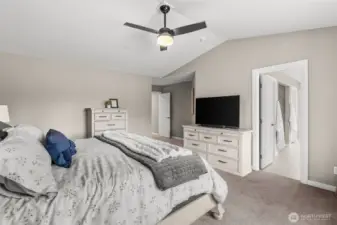 This elegant primary bedroom features is own spa-like en-suite bathroom!