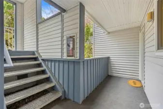 Covered entry with Stair access and sheltered front door