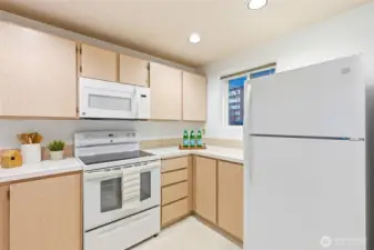 Kitchen featuring full appliance package and efficient layout