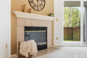 Living area with fireplace and access to outdoor space