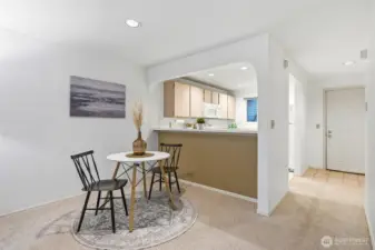 Open-concept layout connecting kitchen and dining area