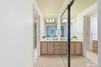 Vanity area with ample counter space and storage