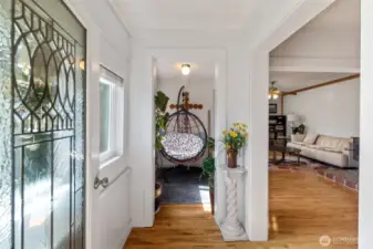 An attractive entry into the home. The living room is off to the right.