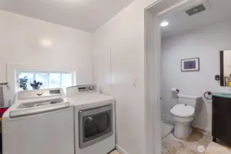 The laundry room and full bath on the main level.