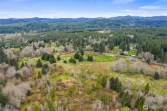 A good look at the lower 47+- acre section below the road. The home on the upper section is visible in the upper right of this photo. You can also see Power's Creek meandering through the lower acreage.