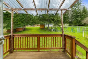 Looking upward from the deck outside the upstairs room. A great spot to relax and check out what's happening on this beautiful acreage.