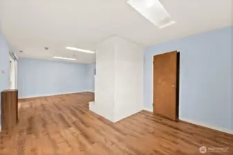 Around the corner of the great room is the Utility Room complete with Washer and Dryer as well as a half bath.