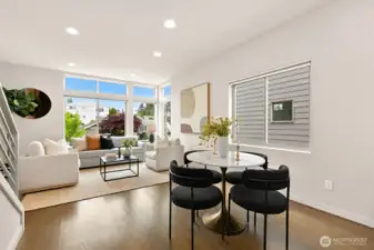 This living area has a wonderful layout and can accommodate lots of seating - as well as a larger dining table.