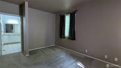 Primary bedroom looking into huge primary bathroom