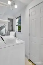 Utility/Mud room with access to huge backyard.