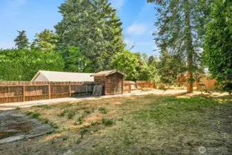 Back yard with storage shed, RV or boat parking and fenced.