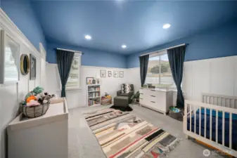 Bedroom 1 is bright and comfortable and features large walk-in closet