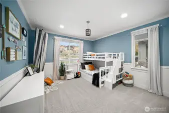 Bedroom 2 offers plenty of space, cheerful natural light and 2 walk-in closets.