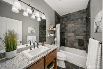 Beautifully finished guest bathroom with modern fixtures and a crisp, neutral palette