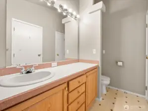 Plenty of room to add a second sink in the primary bath