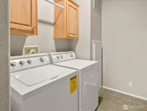 Laundry room with washer and dryer included