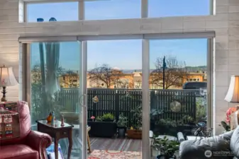 Spacious living room flows out onto the beautiful patio. Fully tiled throughout the living room, kitchen and entryway. Just some of the amenities this unit has waiting for you.