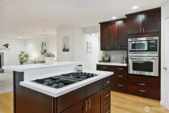 An outward facing island cooktop keeps the chef connected in this social layout.