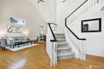 Follow the gracious stairway up to the second level.