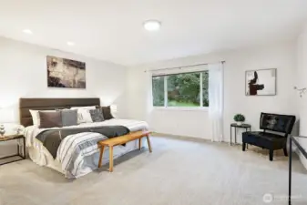 Upstairs, your spacious primary suite awaits you.