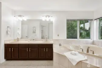 Relax your cares away in the corner soaking tub.