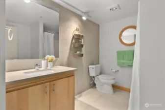 Spacious bathroom or ADA or additional cabinets.