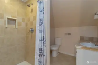 Upper level bathroom. 3/4 with nicely tiled shower