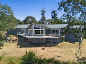 View side of home with expansive deck.