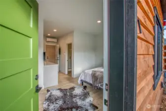 The first-floor south exterior door provides a private access to the studio, which can be securely locked off from the rest of the townhouse. The Mudroom on the north side has an exterior door serving the upstairs floors.