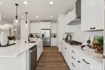 Photos are of the model home. Colors & finishes may vary.