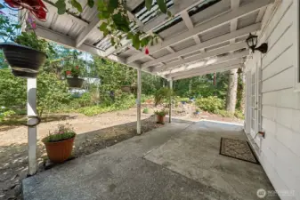 Another view of the space.  Yard is maintained by the HOA but homeowner has an opportunity to get creative with  potted garden.