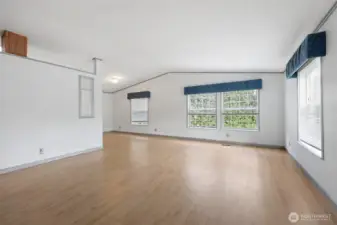 Looking from the front door toward the kitchen 'round the corner.