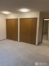 Primary bedroom with two good size closets.
