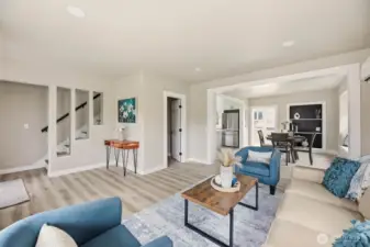 New interior paint throughout the home. Stairwell leads to two bedrooms and two baths upstairs.