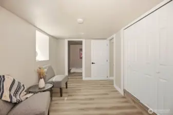 Another shot of the living room shows the closet for the bedroom to the right and a great bedroom nook in the back.