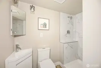 Three quarter bathroom is basement is perfect for whatever you decide to use the basement for.