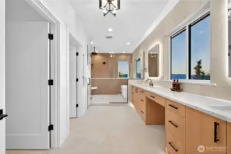 Primary ensuite designed with you in mind, featuring heated floors, abundant natural light, and breathtaking views of Lake Sammamish.