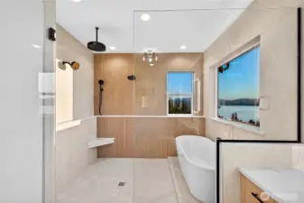 Primary ensuite with a spa-style walk-in wetroom, combining a walk-in shower and luxury soaker tub, offering stunning Lake Sammamish views while maintaining full privacy.