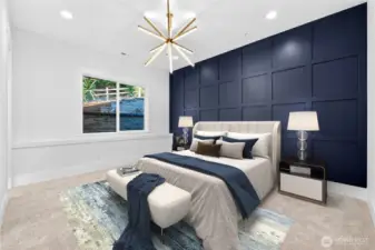 Spacious main-level guest suite with ensuite bathroom and walk-in closet offers multigenerational or primary-level living convenience. A window provides natural light, privacy, and views of the Native Growth Protection Area.